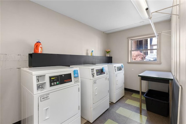765 Houston Mill Rd NE Unit 7, Atlanta, GA 30329 - communal laundry room with independent washer and dryer and light flooring