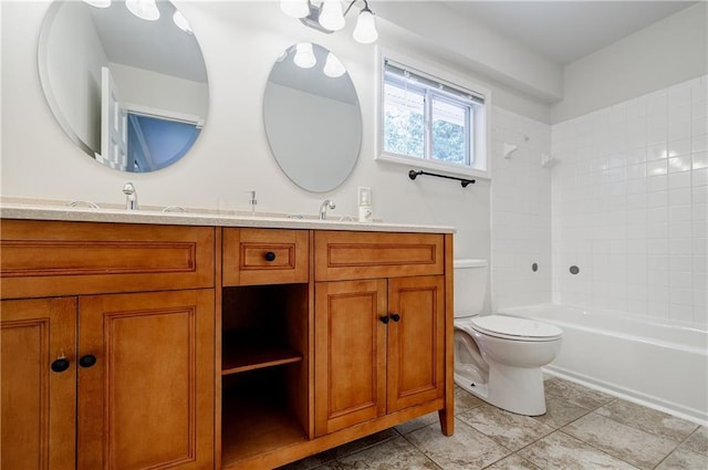 2985 Westbury Dr, Decatur, GA 30033 - bathroom featuring toilet, double vanity, washtub / shower combination, and tile patterned floors