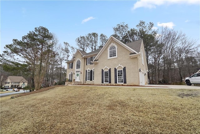 view of property featuring a front yard