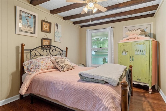 8669 Davis St, Braselton, GA 30517 - bedroom with dark wood-style floors, ceiling fan, baseboards, wood walls, and wooden ceiling with exposed beams