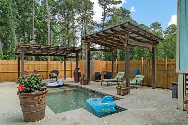 8669 Davis St, Braselton, GA 30517 - view of swimming pool featuring a pergola, a patio area, and a fenced backyard