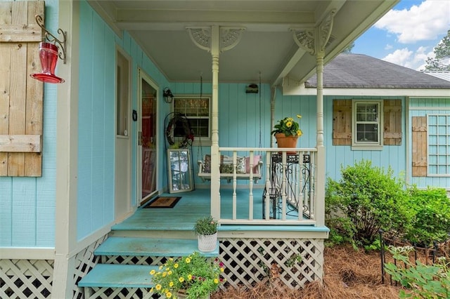 8669 Davis St, Braselton, GA 30517 - doorway to property featuring a porch and roof with shingles