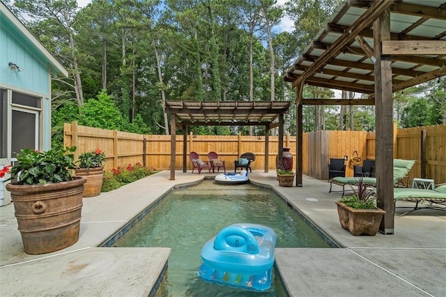 8669 Davis St, Braselton, GA 30517 - view of pool with a pergola, a patio area, and a fenced backyard