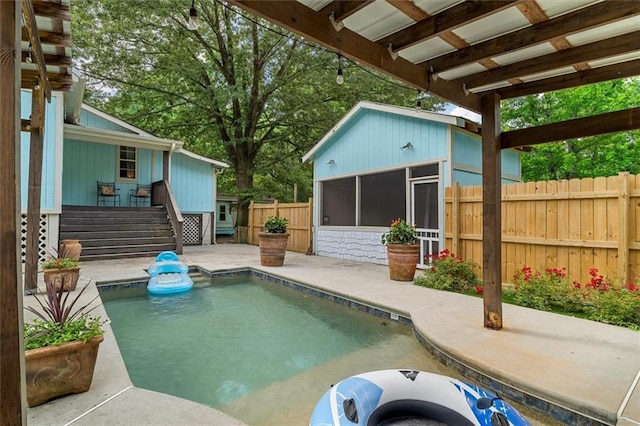 8669 Davis St, Braselton, GA 30517 - view of pool featuring a sunroom, stairs, and a patio