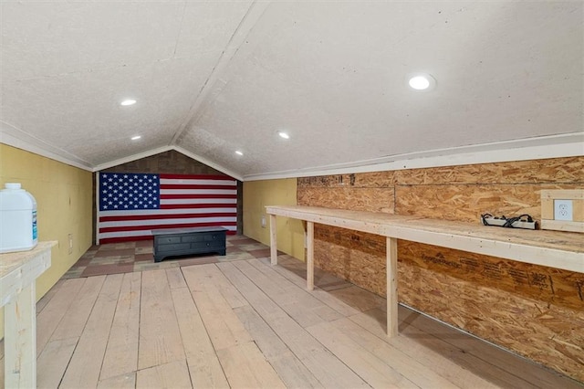 8669 Davis St, Braselton, GA 30517 - additional living space with hardwood / wood-style floors and lofted ceiling