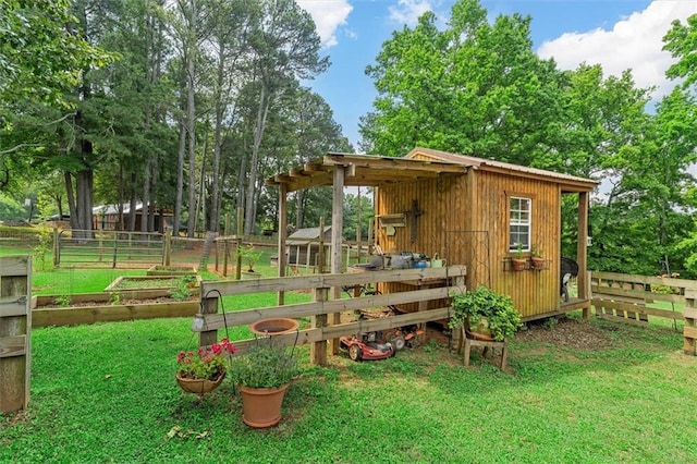 8669 Davis St, Braselton, GA 30517 - view of outbuilding with a garden