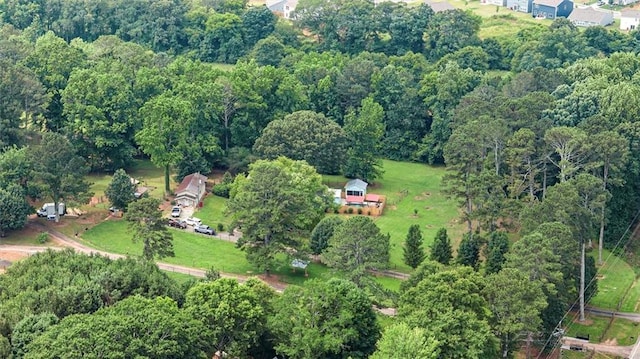 8669 Davis St, Braselton, GA 30517 - aerial overview of property's location featuring a forest