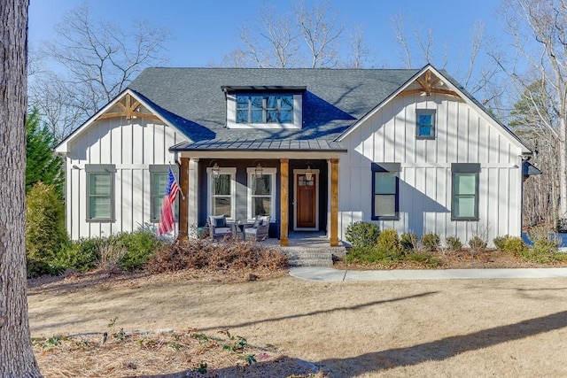 modern inspired farmhouse featuring covered porch