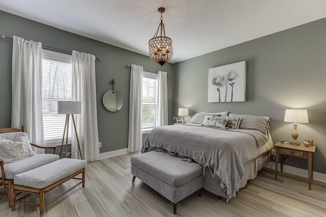 bedroom with light hardwood / wood-style floors