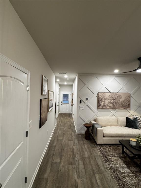 living room with dark hardwood / wood-style floors