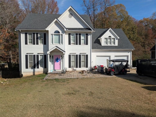 405 Baneberry Bnd, Peachtree City, GA 30269 - colonial house featuring a garage and a front lawn