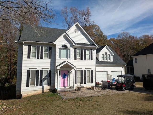 405 Baneberry Bnd, Peachtree City, GA 30269 - colonial house with a garage and a front lawn