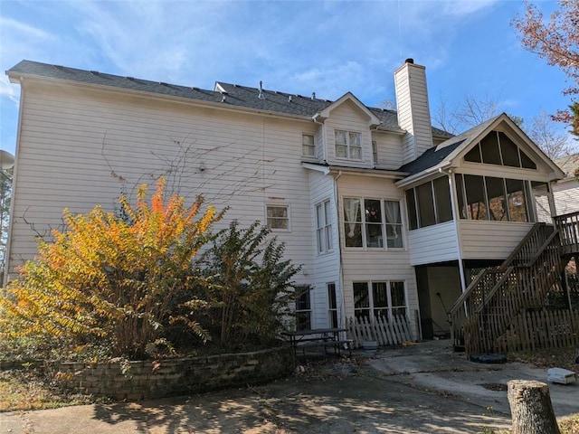 405 Baneberry Bnd, Peachtree City, GA 30269 - back of house with a sunroom