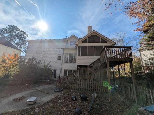 405 Baneberry Bnd, Peachtree City, GA 30269 - back of property with a deck and a sunroom