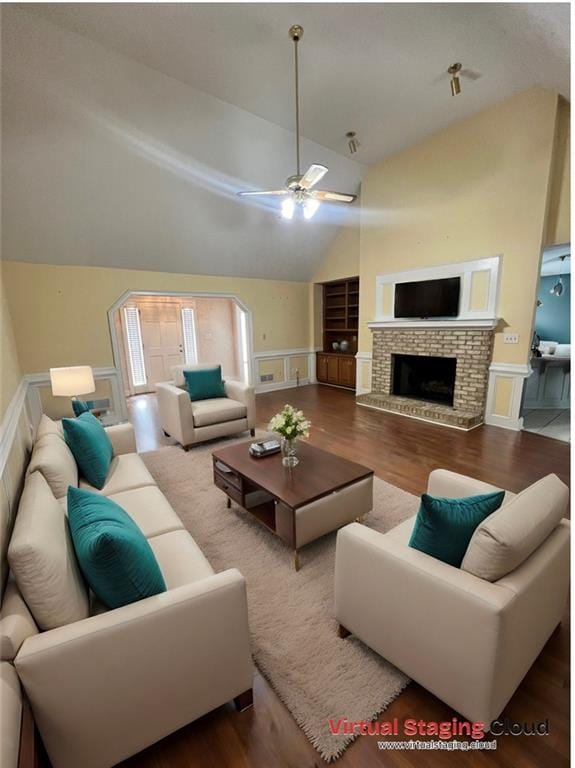 living room with high vaulted ceiling, hardwood / wood-style floors, and ceiling fan