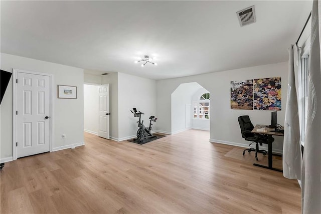 3285 Country Walk Dr, Powder Springs, GA 30127 - office space featuring light wood-style floors, arched walkways, and baseboards