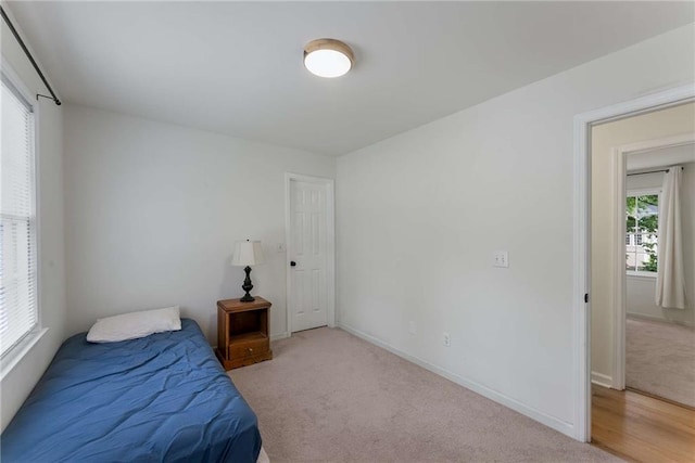 3285 Country Walk Dr, Powder Springs, GA 30127 - carpeted bedroom with baseboards
