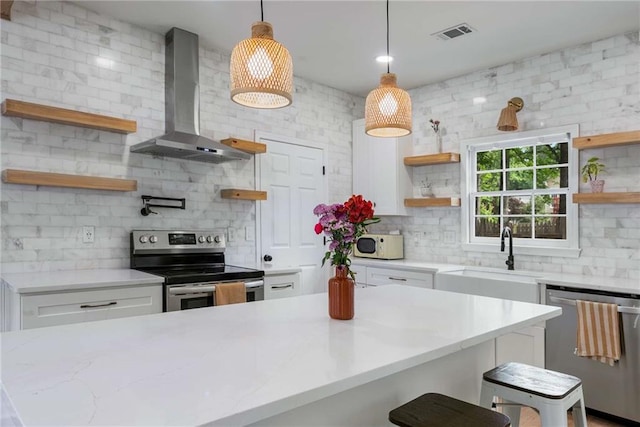 3285 Country Walk Dr, Powder Springs, GA 30127 - kitchen featuring open shelves, stainless steel appliances, wall chimney range hood, a sink, and tasteful backsplash