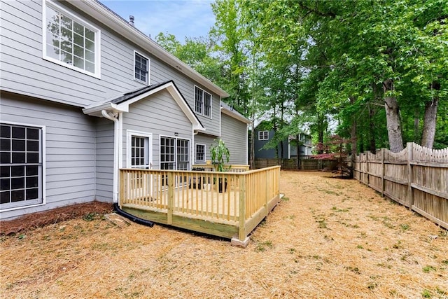 3285 Country Walk Dr, Powder Springs, GA 30127 - rear view of property with a fenced backyard and a deck