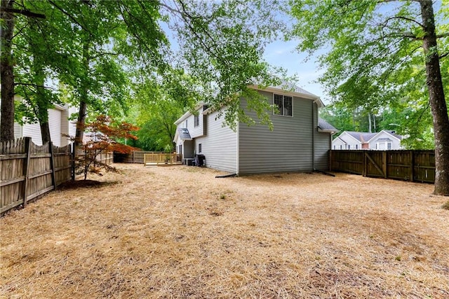 3285 Country Walk Dr, Powder Springs, GA 30127 - back of house featuring a fenced backyard