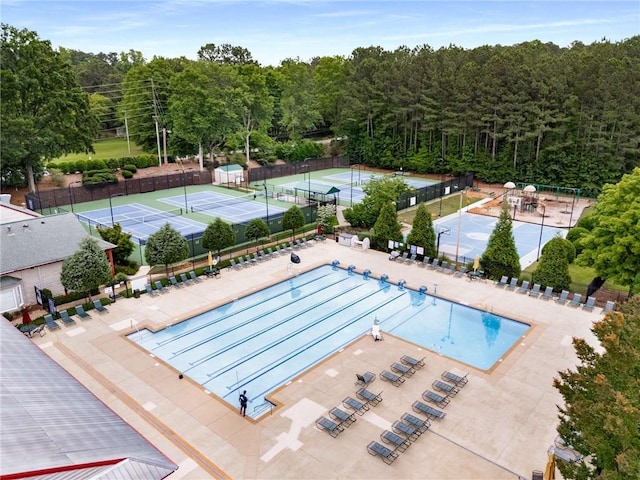 3285 Country Walk Dr, Powder Springs, GA 30127 - view of swimming pool featuring fence and a tennis court
