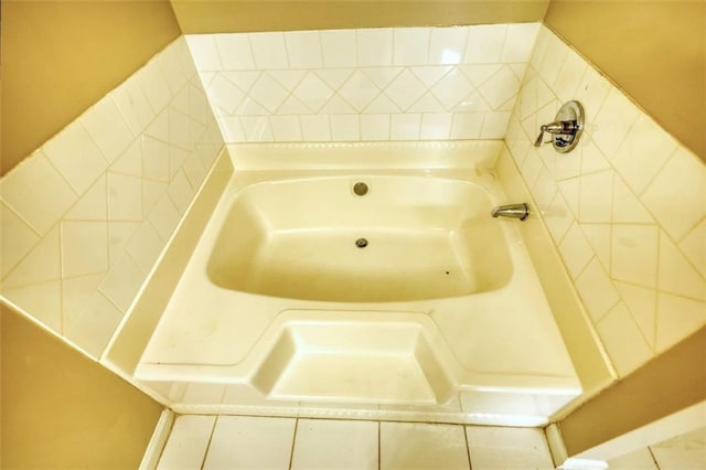 bathroom with a garden tub