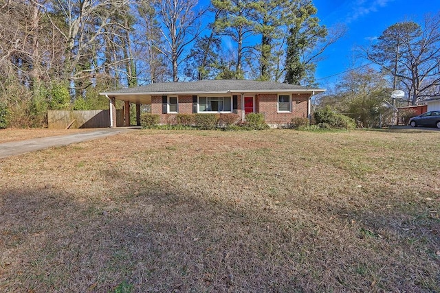 single story home featuring a carport and a front lawn