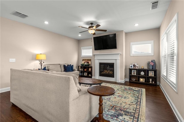 508 Windy Ridge Ct, Canton, GA 30114 - living room with ceiling fan, dark wood finished floors, a glass covered fireplace, and recessed lighting