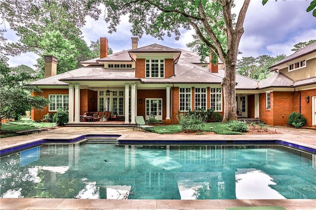 rear view of house with french doors