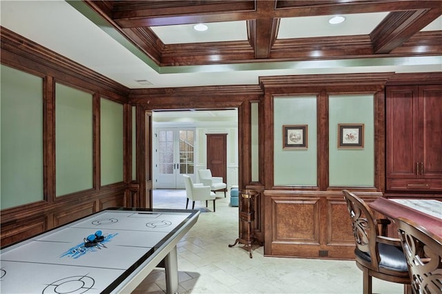 playroom with beam ceiling, ornamental molding, and coffered ceiling