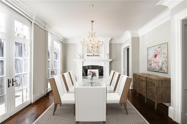 dining space with a fireplace, crown molding, french doors, and dark wood-type flooring