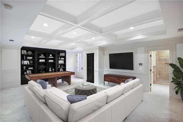 living room featuring beamed ceiling and coffered ceiling