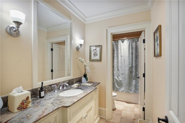 bathroom featuring vanity, toilet, and crown molding