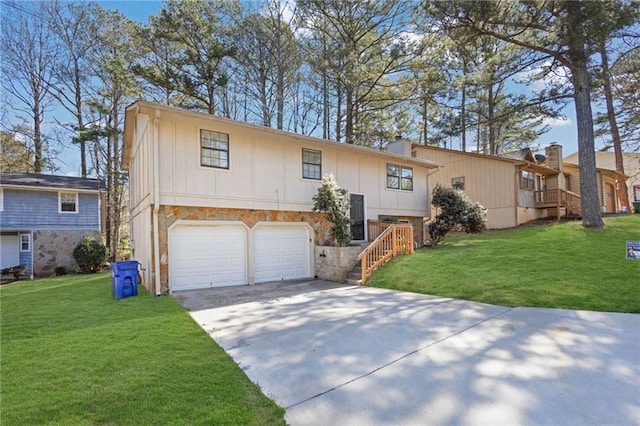 2044 Teal Cv, Lithonia, GA 30058 - raised ranch with an attached garage, a front lawn, driveway, and stone siding