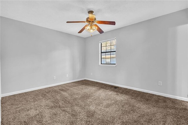 2044 Teal Cv, Lithonia, GA 30058 - carpeted empty room featuring baseboards, ceiling fan, and visible vents