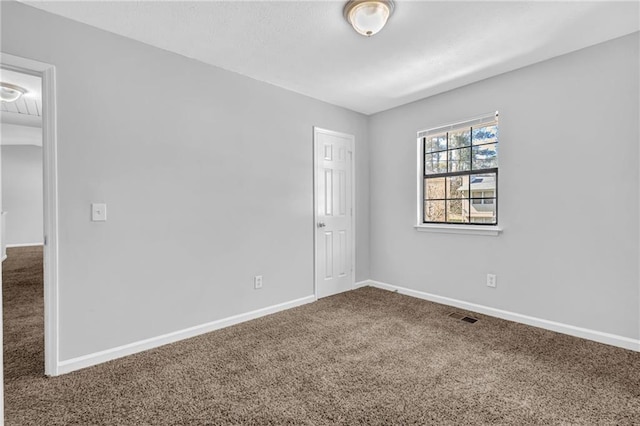 2044 Teal Cv, Lithonia, GA 30058 - empty room with baseboards, visible vents, and carpet