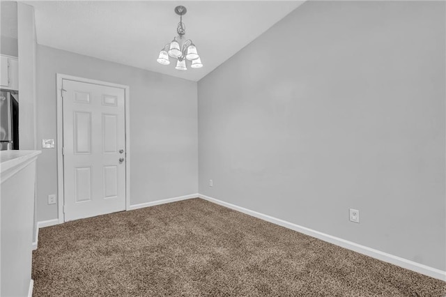 2044 Teal Cv, Lithonia, GA 30058 - interior space with an inviting chandelier, baseboards, and carpet