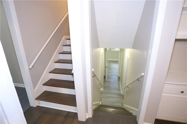 stairway with wood-type flooring