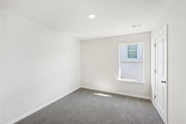 view of carpeted spare room