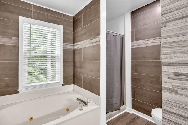 3910 Meeting St, Duluth, GA 30096 - bathroom featuring a shower stall, a whirlpool tub, toilet, and wood finished floors