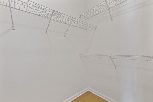 3334 Peachtree Rd NE Unit 101, Atlanta, GA 30326 - walk in closet featuring light wood-style floors