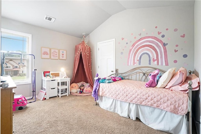 carpeted bedroom featuring lofted ceiling