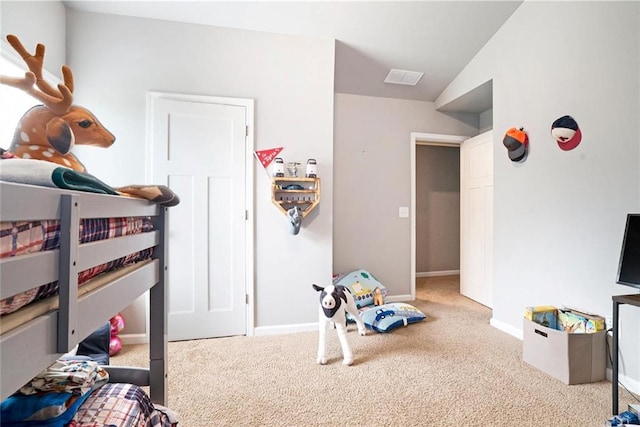 carpeted bedroom with baseboards