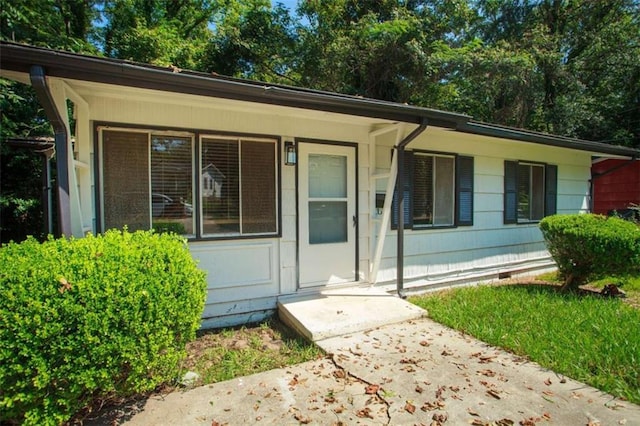 view of front of home with crawl space