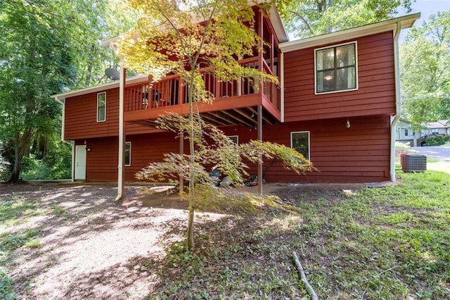 4771 N Springs Rd NW, Kennesaw, GA 30144 - back of property with a deck and central air condition unit