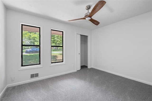 4771 N Springs Rd NW, Kennesaw, GA 30144 - unfurnished bedroom featuring carpet, baseboards, and a ceiling fan