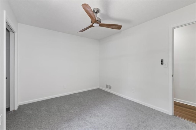 4771 N Springs Rd NW, Kennesaw, GA 30144 - unfurnished bedroom with carpet flooring, baseboards, and ceiling fan
