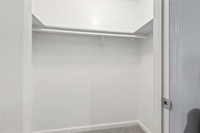 4771 N Springs Rd NW, Kennesaw, GA 30144 - spacious closet featuring carpet flooring