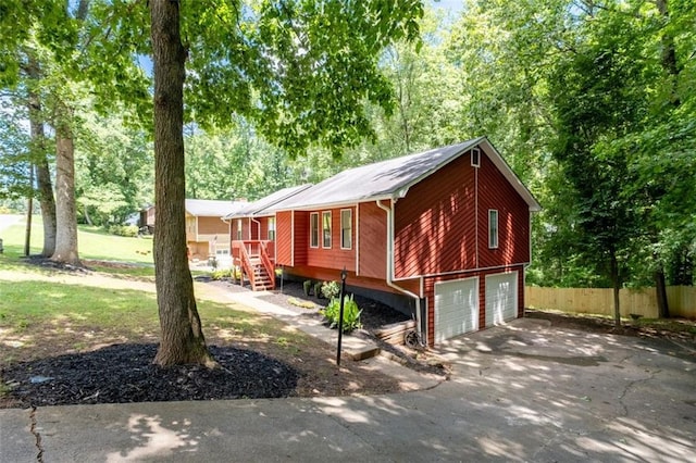 4771 N Springs Rd NW, Kennesaw, GA 30144 - view of front of home featuring asphalt driveway, stairs, and an attached garage
