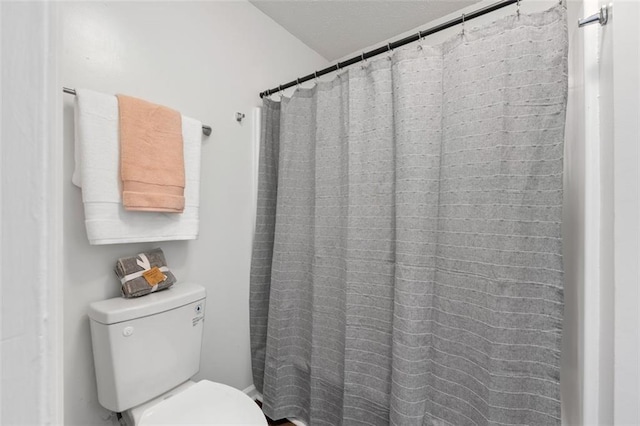 4771 N Springs Rd NW, Kennesaw, GA 30144 - bathroom featuring toilet and curtained shower